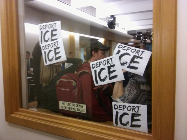 deport-ice-window-plastered